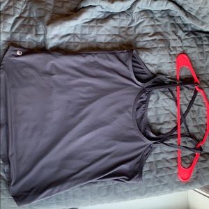 FABLETICS strappy grey workout top in size medium
